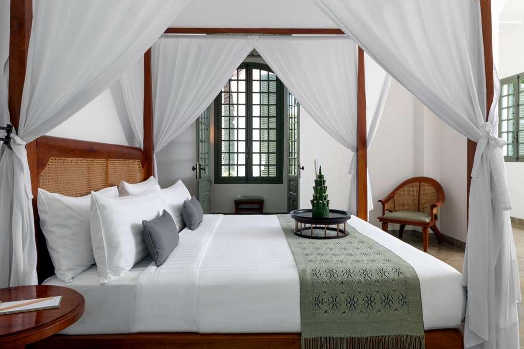 Amantaka Resort Луанґпхабанґ Номер фото